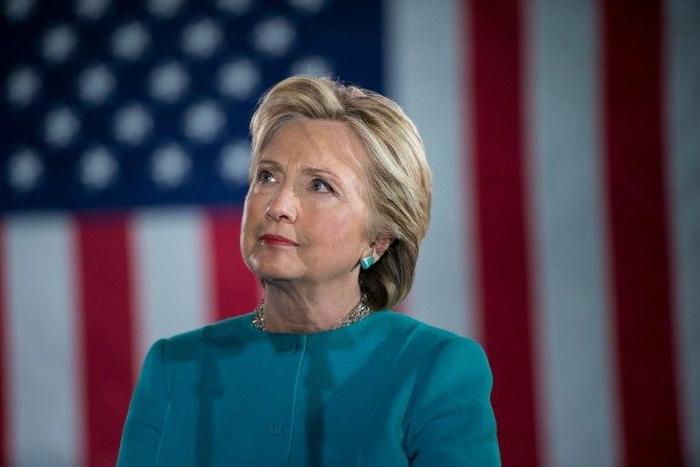 Democratic presidential nominee Hillary Clinton waits to speak during a rally at the Armory November 6, 2016 in Manchester, New Hampshire