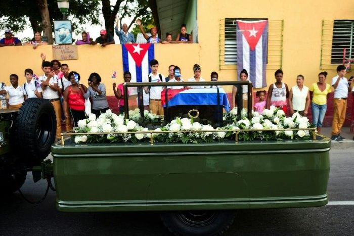 The urn with the ashes of Cuban revolutionary leader Fidel Castro leaves Revolution Square in Santiago, on December 4, 2016