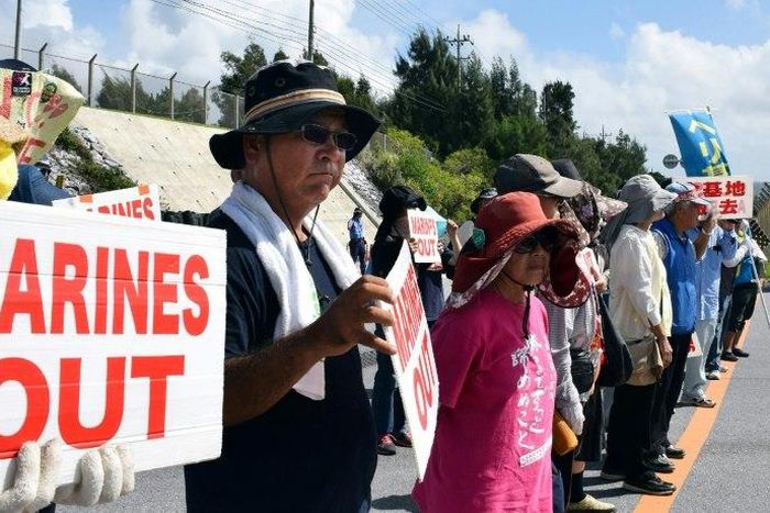 Protesters outside Camp Schwab in Nago, Okinawa prefecture, in September