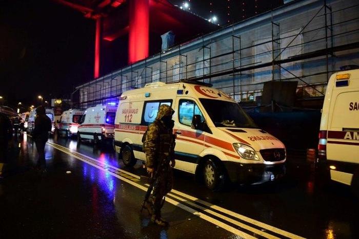 Turkish special force police officers and ambulances are seen at the site of an armed attack at the Reina nightclub in Istanbul on January 1, 2017