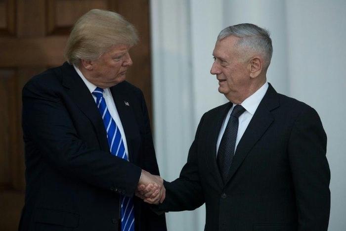 Donald Trump shakes hands with retired United States Marine Corps general James Mattis after their meeting at Trump International Golf Club, November 19, 2016 in Bedminster Township, New Jersey