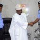 Oyo state gov, Abiola Ajimobi with the police commissioner Oyo State Command, Samuel Adegbuyi and the former police commissioner, Leye Oyebade