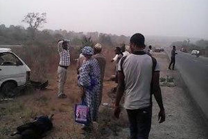 An accident victim lies dead on the ground.