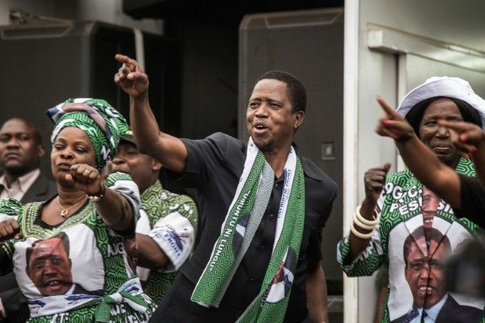 Edward Lungu (C) was narrowly reelected as Zambia's president with 50.35 percent of the vote 