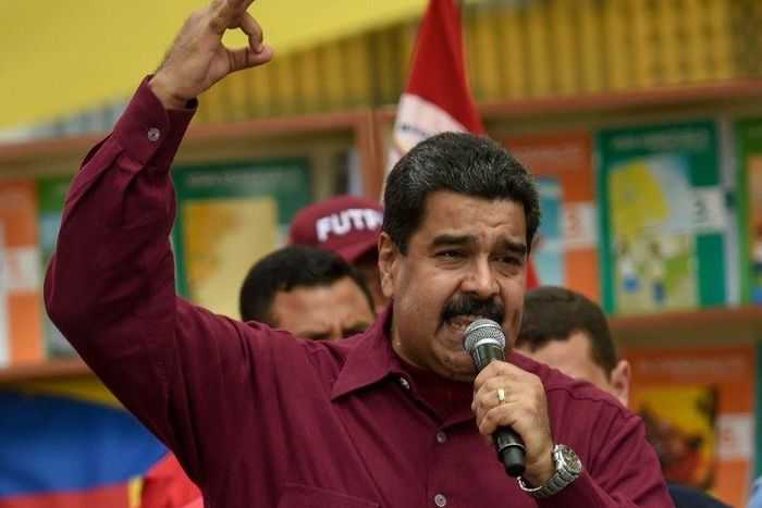 Venezuelan President Nicolas Maduro speaks during a meeting in Caracas on October 28, 2016