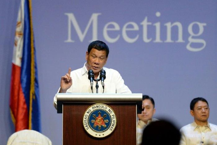 Philippines President Rodrigo Duterte speaks during a meeting with the Filipino community in Singapore on December 16, 2016