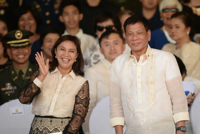 Philippines President Rodrigo Duterte (right) poses for photographs with Vice-President Leni Robredo in Manila on July 1, 2016