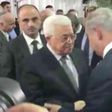 Palestinian president, Netanyahu shake hands at Peres funeral