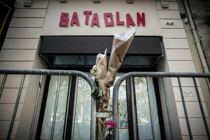 Flowers tied to a fence outside the Bataclan concert hall during All Saints' day in Paris on November 1, 2016