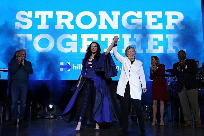 Pop star Katy Perry, seen campaigning with Hillary Clinton November 5, 2016, told her fans not to "sit still" or "weep" after Donald Trump's election as US president