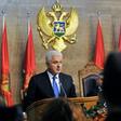 The newly elected Montenegrin Prime Minister Dusko Markovic (C) delivers a speech during a ceremony at the Montenegro Parliament in Podgorica on November 28, 2016
