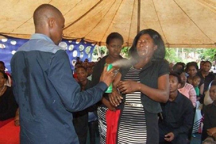 Prophet Lethebo Rabalago using insecticide to heal his members
