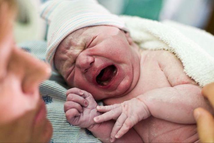 Candid child delivery photo