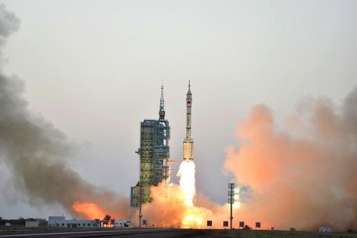 China's Long March-2F carrier rocket transporting the manned spacecraft Shenzhou-11 blasts off from the launch pad at the Jiuquan Satellite Launch Center in north-western Gansu Province, on October 17, 2016
