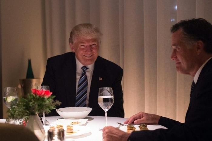 US President-elect Donald Trump (L) dines with Mitt Romny (R) at Jean-Georges restaurant on November 29, 2016 in New York