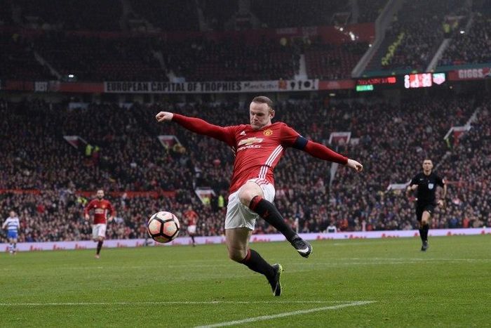 Manchester United's Wayne Rooney has scored his 249th goal for the club to match Bobby Charlton's record, set in March 1973