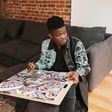 Laolu Senbanjo in New York working on a piece