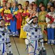Chinese astronauts Jing Haipeng (L) and Chen Dong salute during the send-off ceremony of the Shenzhou-11 manned space mission, at the Jiuquan Satellite Launch Center in north-western Gansu Province, on October 17, 2016