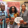 Aramide holds Suitcase album autograph session