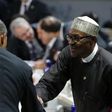 Nigeria's President Muhammadu Buhari (R) greets U.S. President Barack Obama before the start of the second plenary session of the Nuclear Security Summit in Washington April 1, 2016.