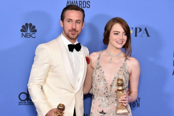 Actor Ryan Gosling (L) and actress Emma Stone pose in the press room during the 74th Annual Golden Globe Awards, at The Beverly Hilton Hotel in Beverly Hills, California, on January 8, 2017