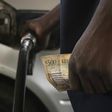 Motorists pumps fuel into his vehicle in the commercial capital Blantyre in this picture taken March 26, 2012. REUTERS/Eldson Chagara