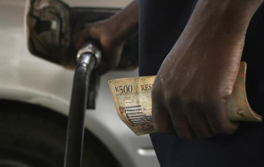 Motorists pumps fuel into his vehicle in the commercial capital Blantyre in this picture taken March 26, 2012. REUTERS/Eldson Chagara