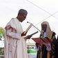 Chief Justice of Nigeria Mahmud Mohammed swears in Muhammadu Buhari (C) as Nigeria's president while Buhari's wife Aisha looks on at Eagle Square in Abuja, Nigeria May 29, 2015. REUTERS/Afolabi Sotunde/File Photo