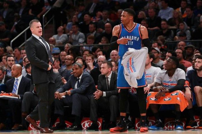 Head coach Billy Donovan of the Oklahoma City Thunder and Russell Westbrook react during the game against the New York Knicks at Madison Square Garden on November 28, 2016