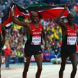Gold medalist James Kiplagat Magut of Kenya, Elijah Motonei Manangoi of Kenya and silver medalist Ronald Kwemoi of Kenya celebrate after the Men's 1500 metres final at the 2014 Commonwealth Games.