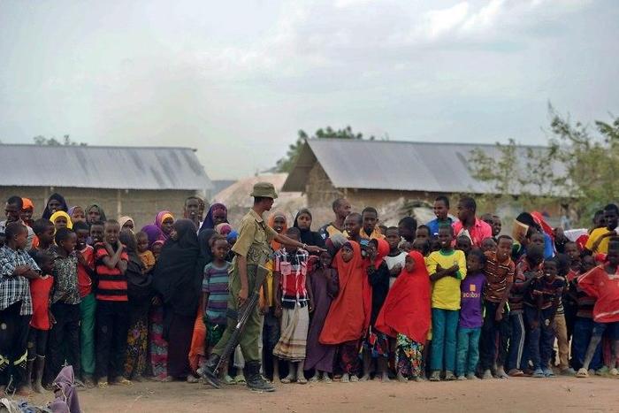 Refugees stand in line at Kenya's sprawling Dadaab refugee complex in July 2016