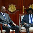 Newly appointed Vice President of South Sudan, Taban Deng Gai (L) and South Sudan's President Salva Kiir (R) pose at State House, in Juba on July 26, 2016 