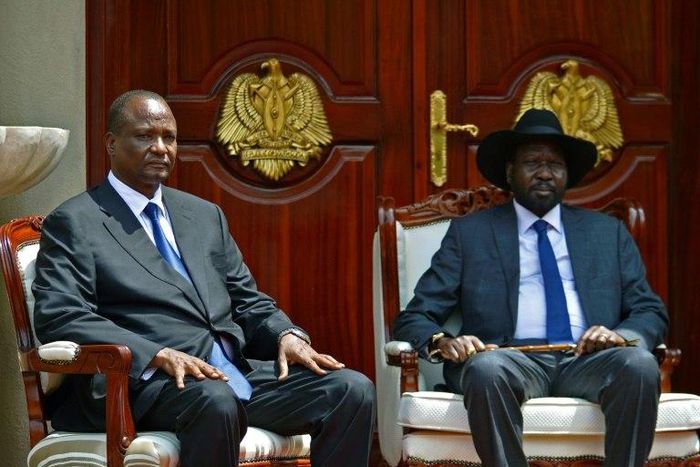 Newly appointed Vice President of South Sudan, Taban Deng Gai (L) and South Sudan's President Salva Kiir (R) pose at State House, in Juba on July 26, 2016 