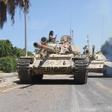 Members of Libyan forces allied with the U.N.-backed ride their tanks during a battle with Islamic State militants in Sirte, Libya September 6, 2016.
