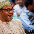 President Muhammadu Buhari laughing