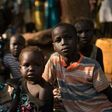 Families wait to find shelter in Juba on July 12, 2016 