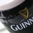 A pint of Guinness beer is seen outside a pub in London, file.