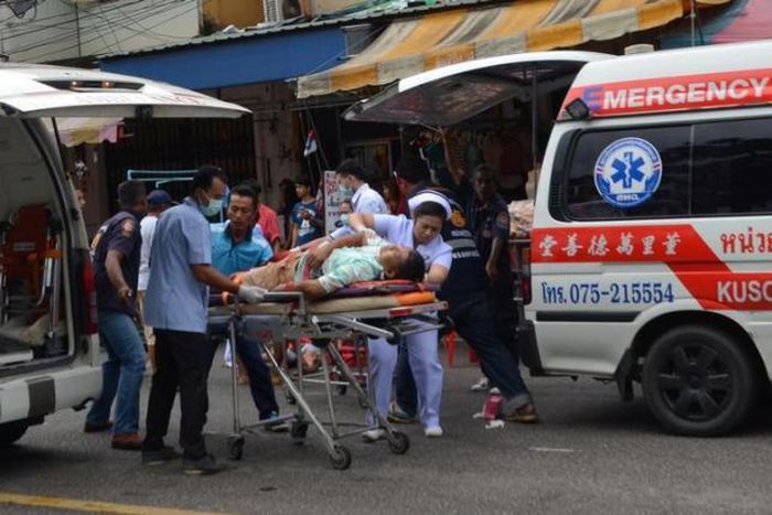 Victims of the bomb blast in Thailand being given emergency treatment.