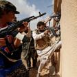 Libyan forces allied with the U.N.-backed government fire weapons during a battle with Islamic State fighters in Sirte, Libya, July 15, 2016.
