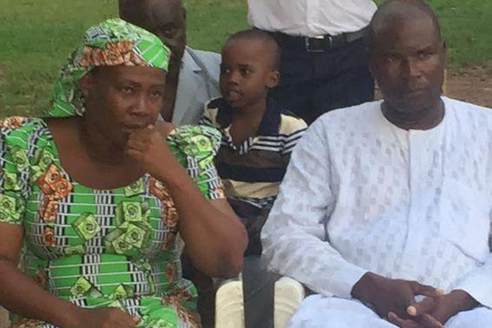 Esther Yakubu, mother of abducted Chibok girl, Dorcas Yakubu, with another parent