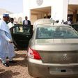 President Buhari inspecting a 'Made-In-Nigeria' Peugeot car