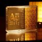 The symbol AU for the chemical element of gold is seen next to one-gram gold bars on display at the annual meeting of German Sparkasse savings banks in Duesseldorf, Germany, April 27, 2016.