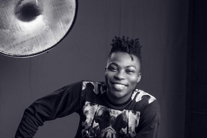 Sepia image of Reekado Banks captured by Paul Ukonu Photography