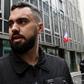 Eric Drouet, one of the leaders of the "yellow vest" movement, leaves police custody in Paris on Thursday