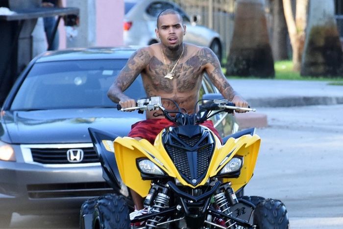 Chris Brown on an ATV
