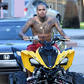Chris Brown on an ATV