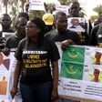 Anti-slavery activists demonstrate in Dakar, Senegal, against the imprisonement of fellow activists in Mauritania, on August 3, 2016 