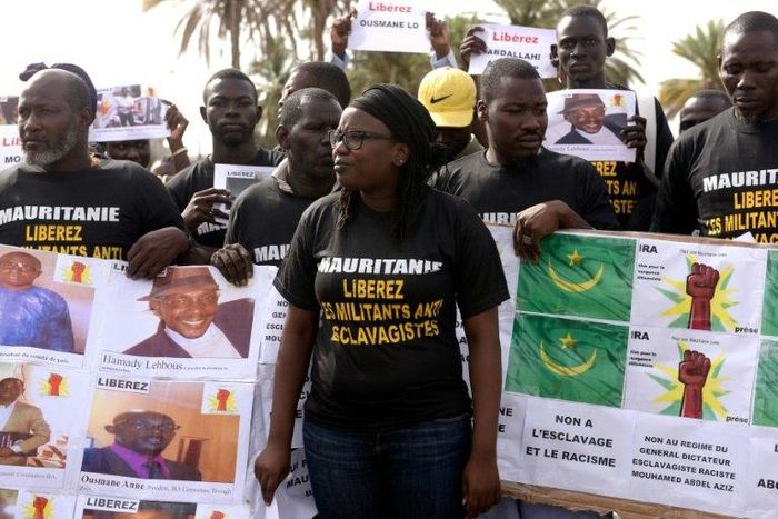 Anti-slavery activists demonstrate in Dakar, Senegal, against the imprisonement of fellow activists in Mauritania, on August 3, 2016 