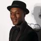 U.S. musician Aloe Blacc poses upon arrival at the Foundation for AIDS Research (amfAR) fundraising gala in Hong Kong, China March 19, 2016.