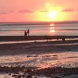 Man proposes to his girlfriend on the shore in Chapin Beach, Massachusetts